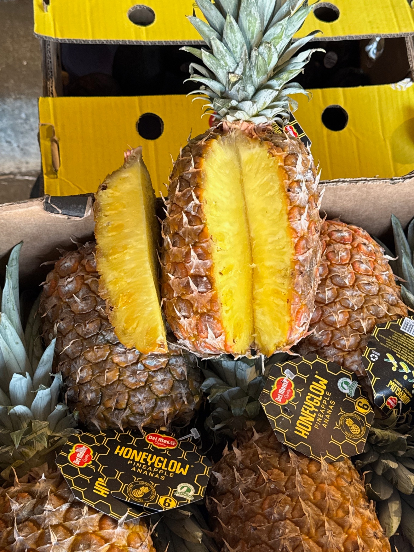 Fresh pineapples being distributed to the community