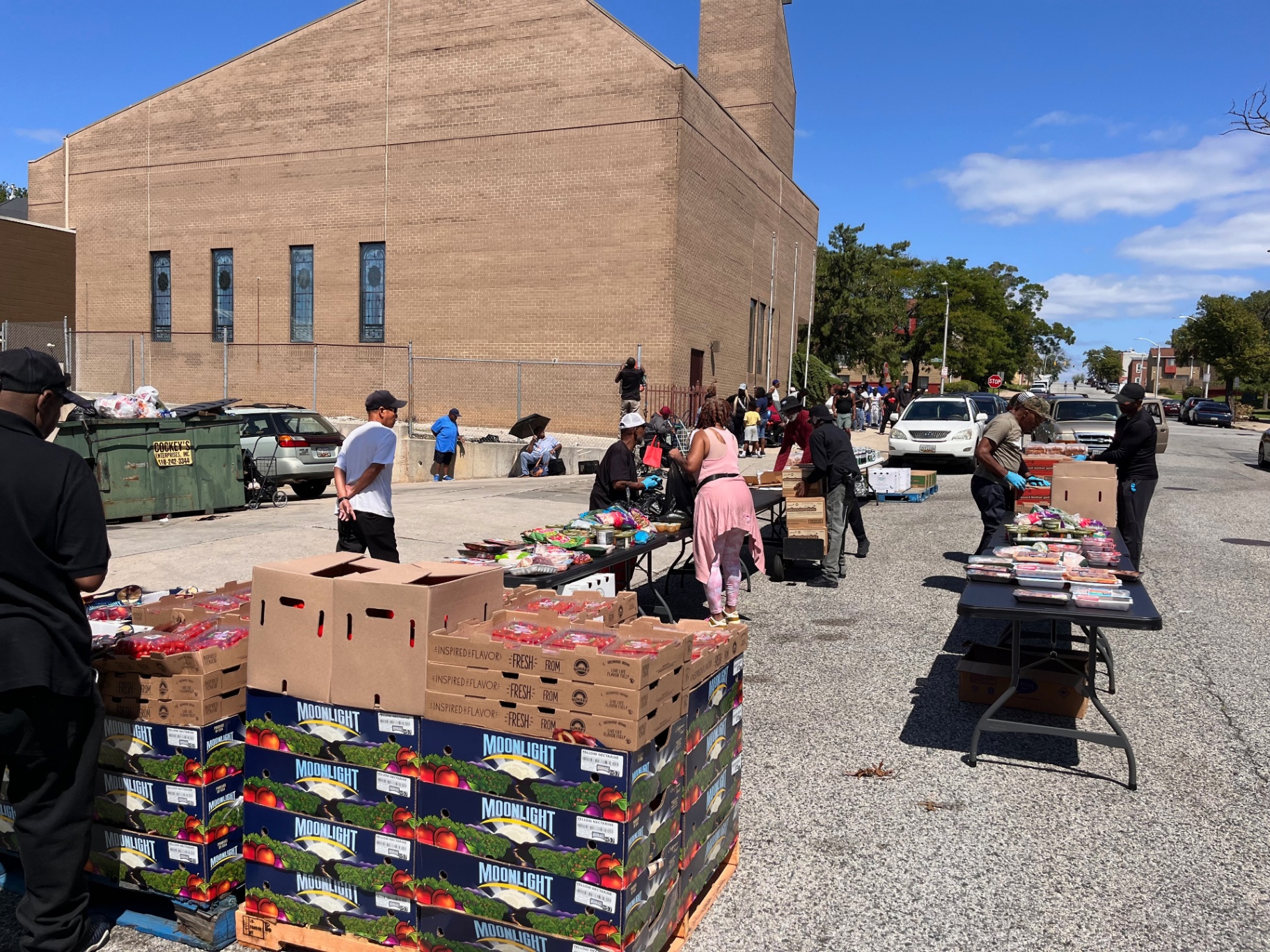 Food distribution site with volunteers and community members