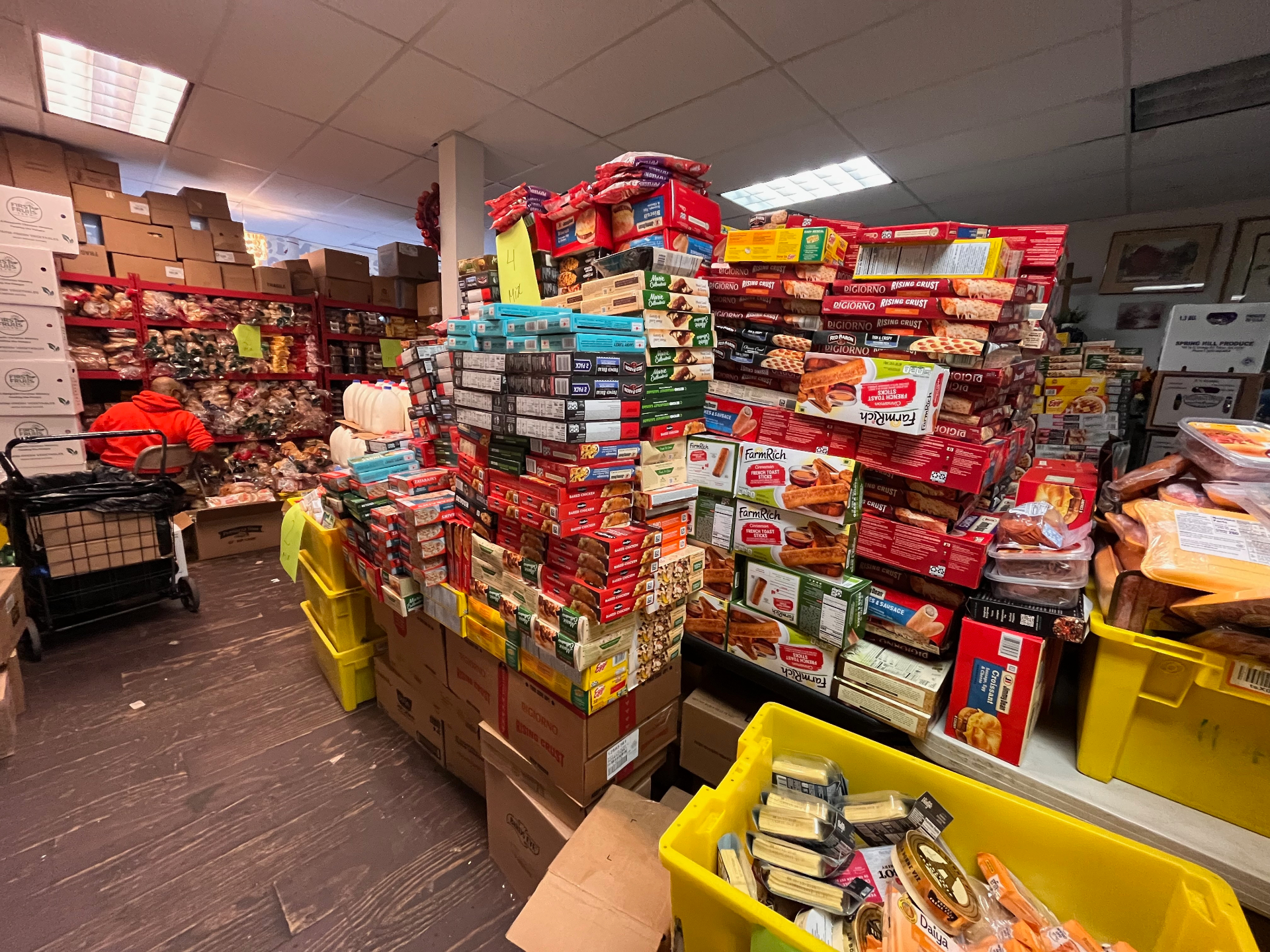 Warehouse with stacked food boxes ready for distribution